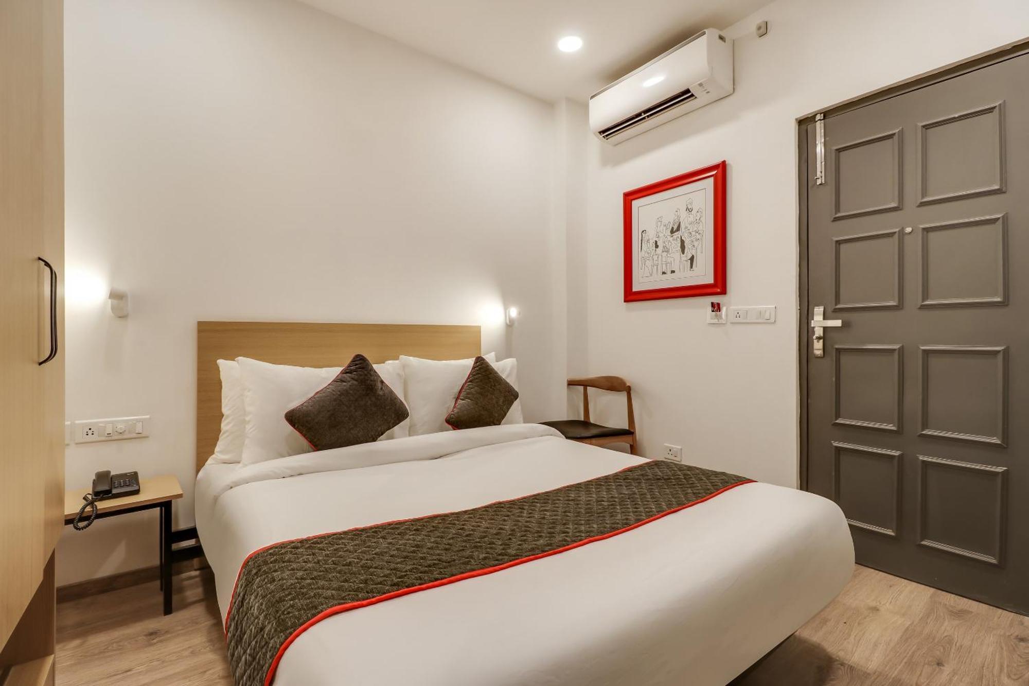 Townhouse Woodland Hotel Nagpur Buitenkant foto