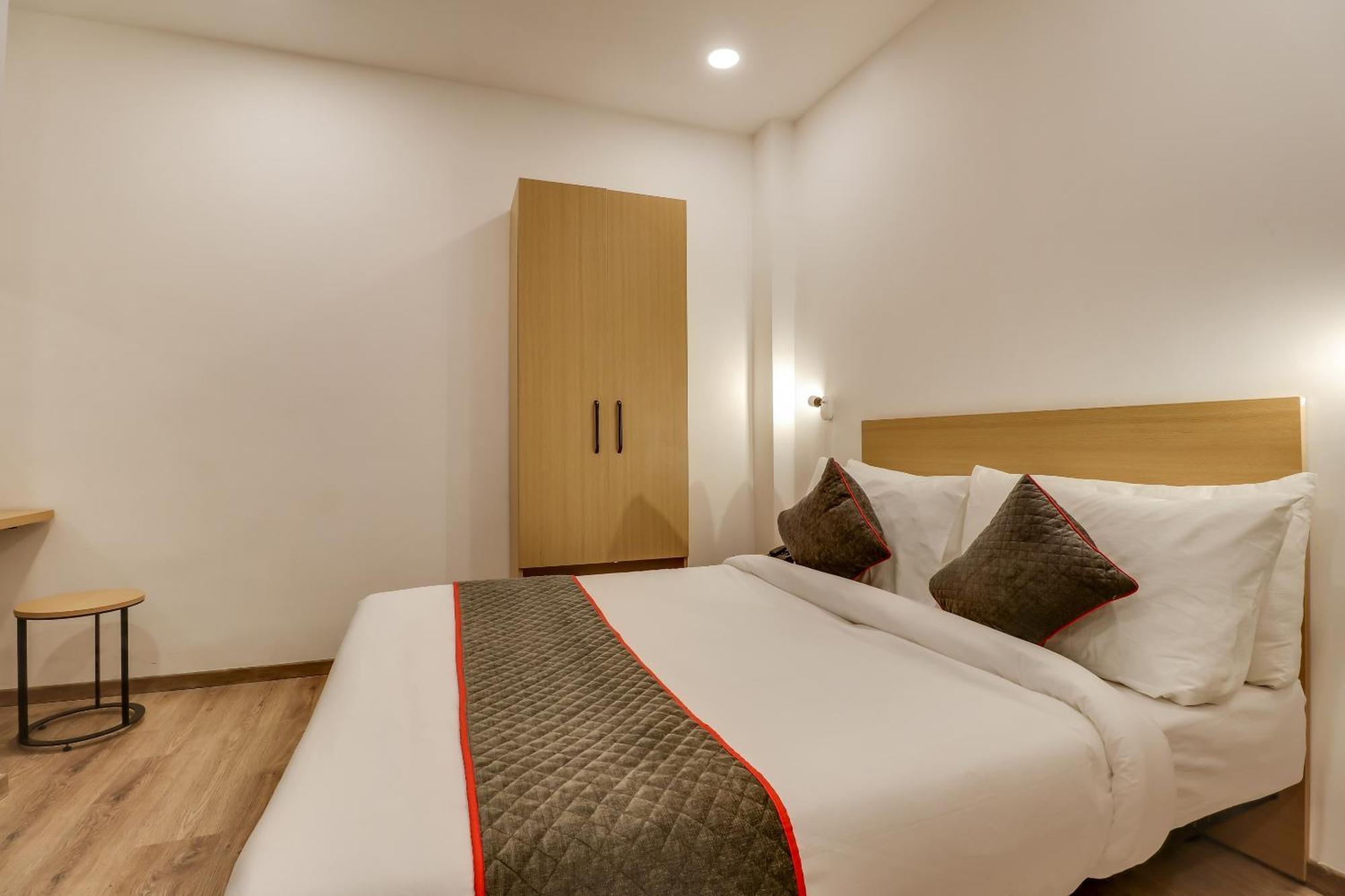 Townhouse Woodland Hotel Nagpur Buitenkant foto